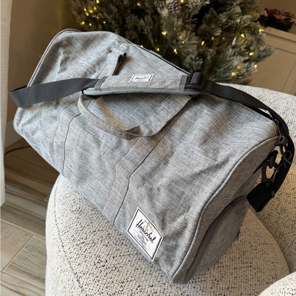 SOLD! 
Herschel Novel Duffle Ravens Crosshatch Gray Duffel Bag